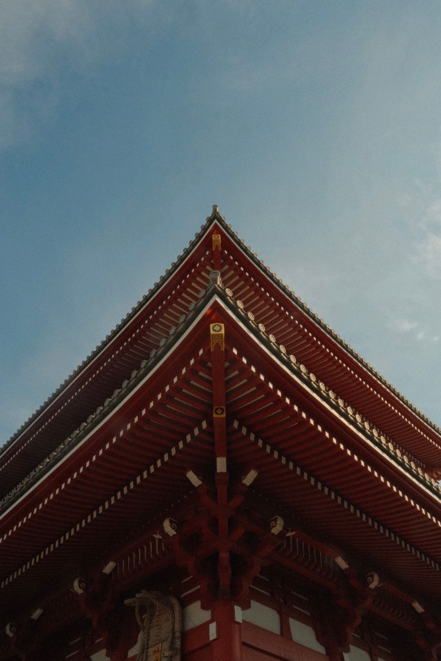 Close-up of interlocking wooden beams joined without nails using traditional Japanese joinery techniques at a temple structure.