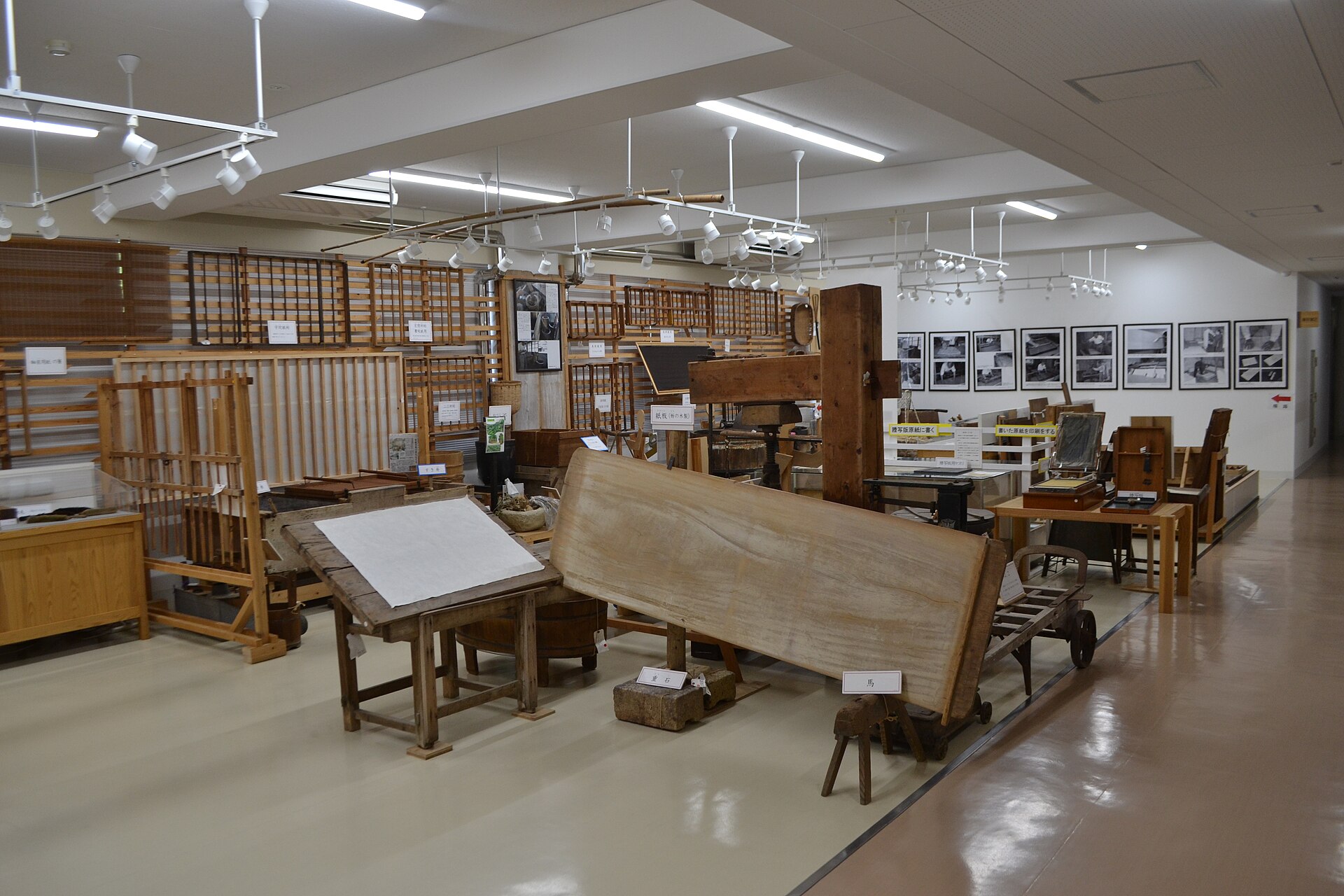 Traditional Mino washi paper stretched across a wooden shoji screen frame, showing its translucent texture and natural fibers.